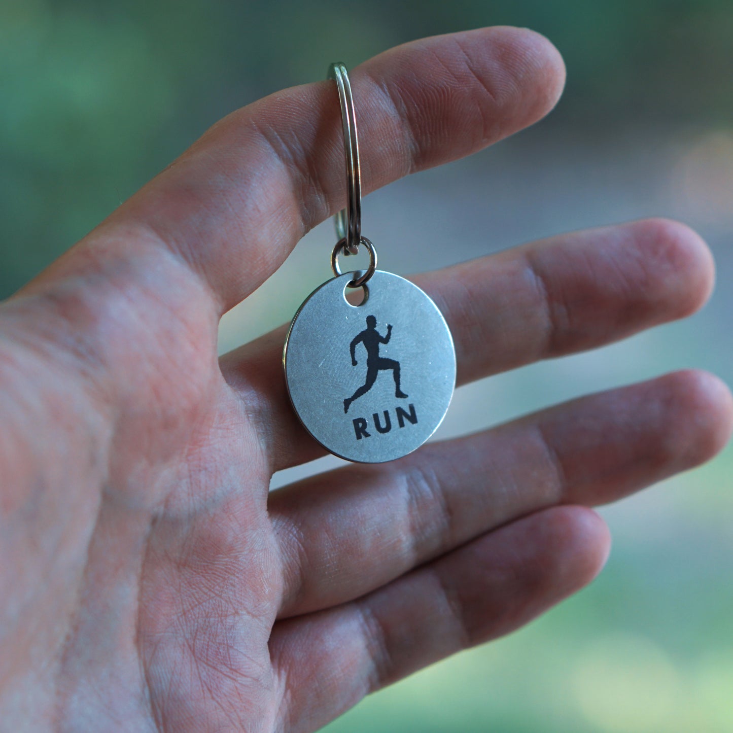 "RUN" Engraved Keychain Pendant