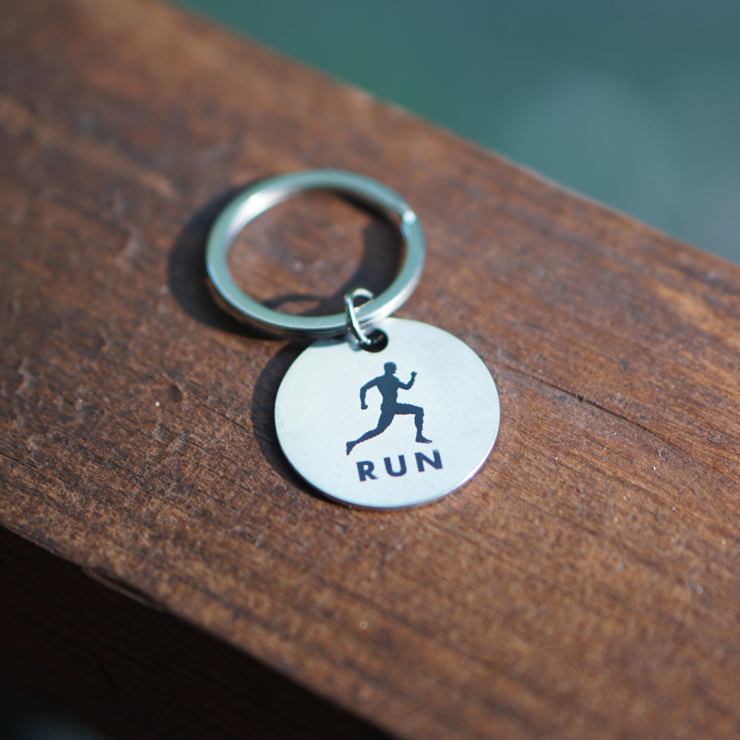 "RUN" Engraved Keychain Pendant